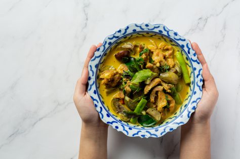 Thai food chicken green curry marble background