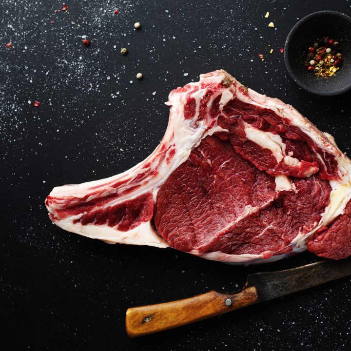 Raw meat with ingredients cooking