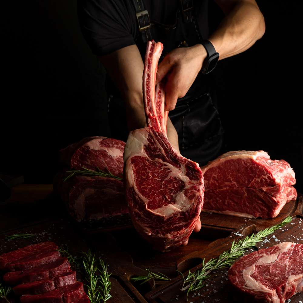 Butcher showing rack ribs