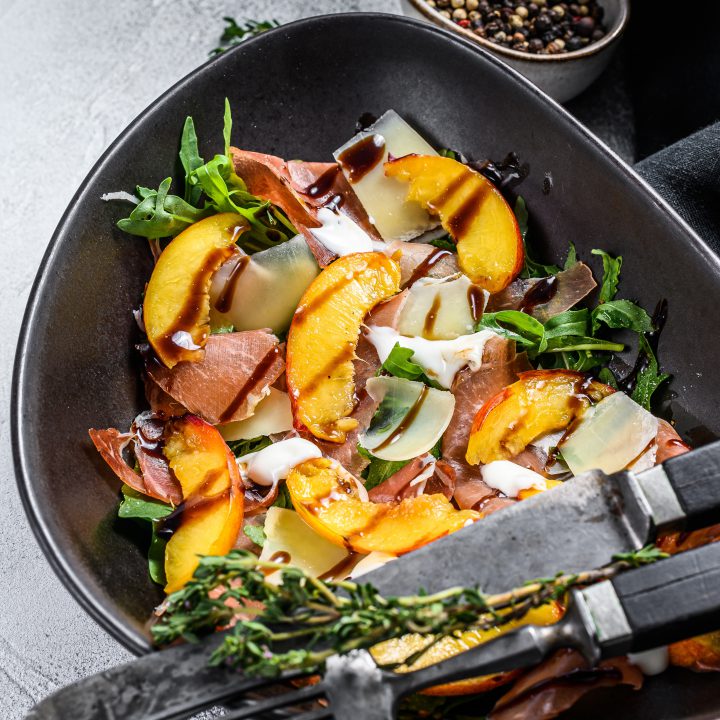 Salad with jamon iberico arugula peach parmesan 1