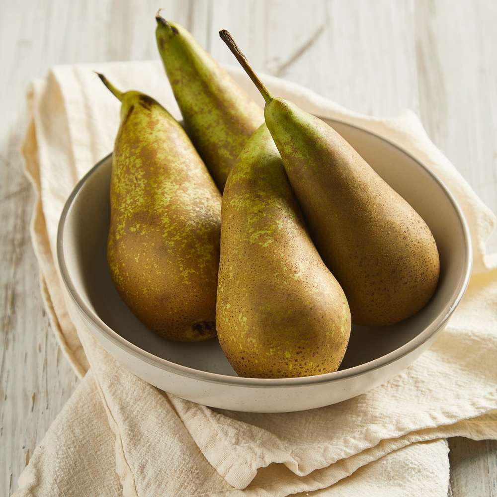 Fresh green pears wooden table