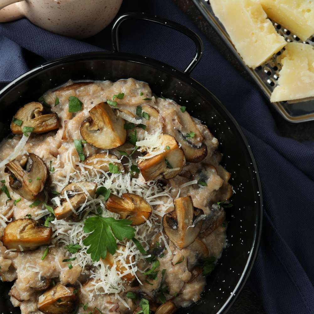 Concept tasty food with risotto with mushrooms top view